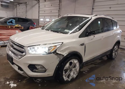 2017 Ford Escape Titanium z USA, uszkodzony, nr VIN 1FMCU9J93HUC69256